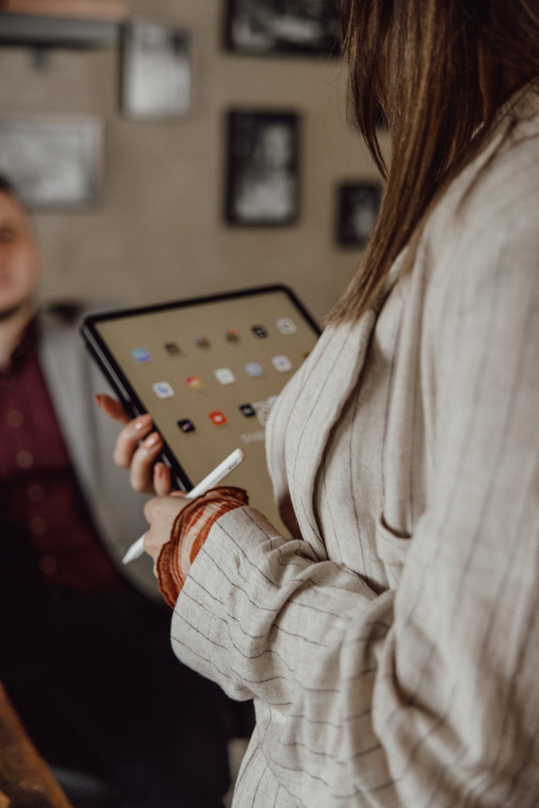 Woman Using Tablet While Working